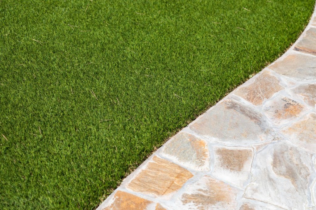 Artificial Grass floor and stone wall