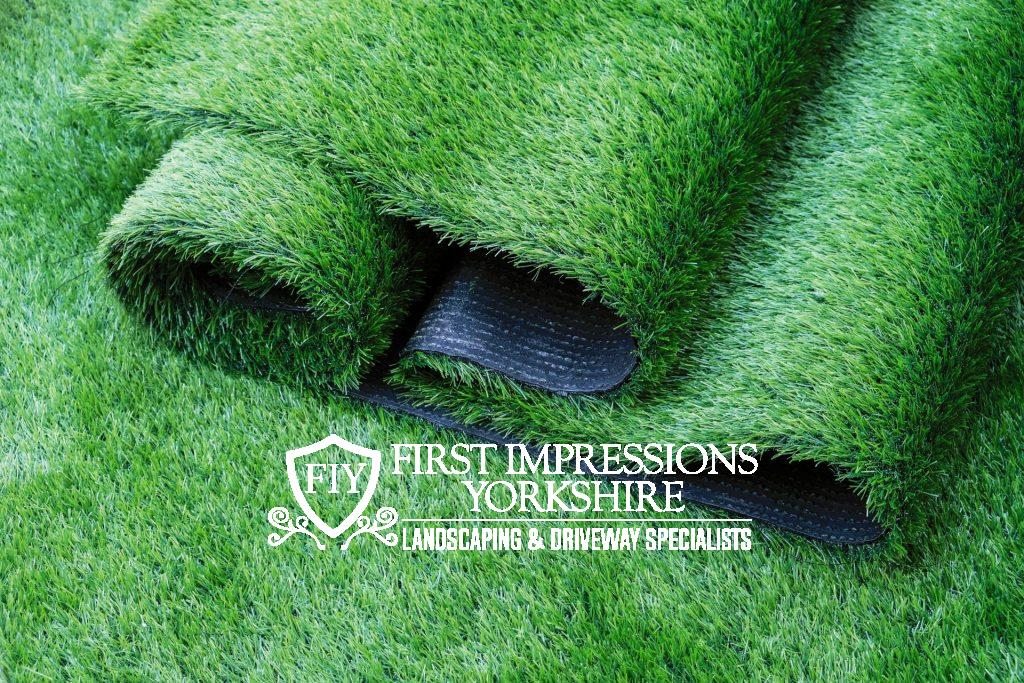 Roll of artificial grass splayed out
