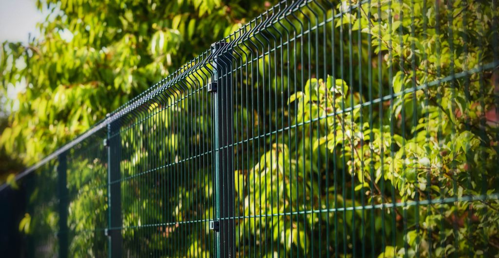 Green security fence made from metal